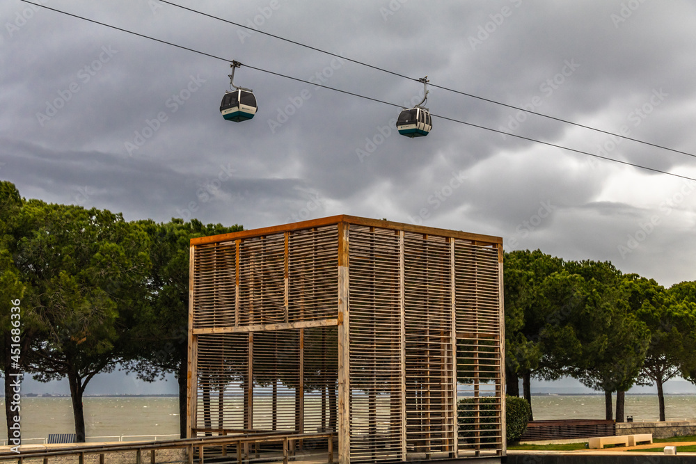 Cable car ride at Nations' park in Lisbon, Portugal, on a cloudy winter day.