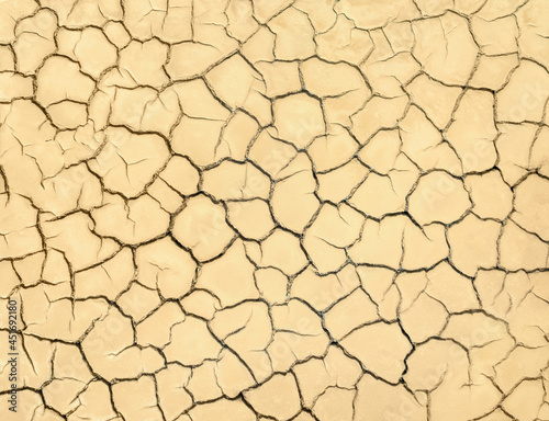 Cracked soil of barren land. Wasteland texture close up