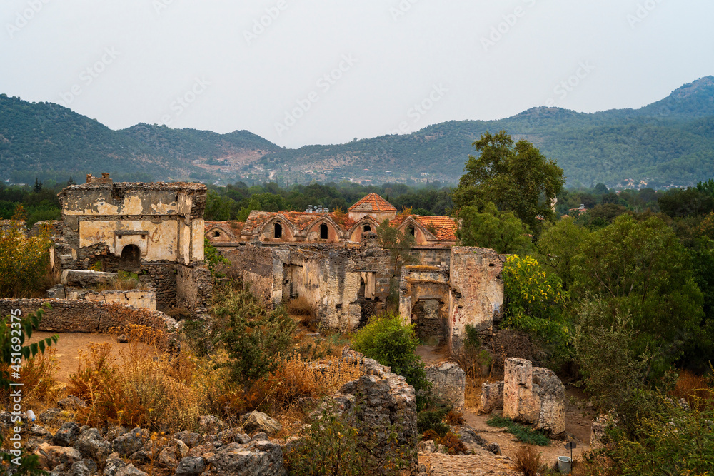 Kayaköy village serves as a museum and is a historical monument. Around 500 houses remain as ruins and are under the protection of the Turkish government, including two Greek Orthodox Churches
