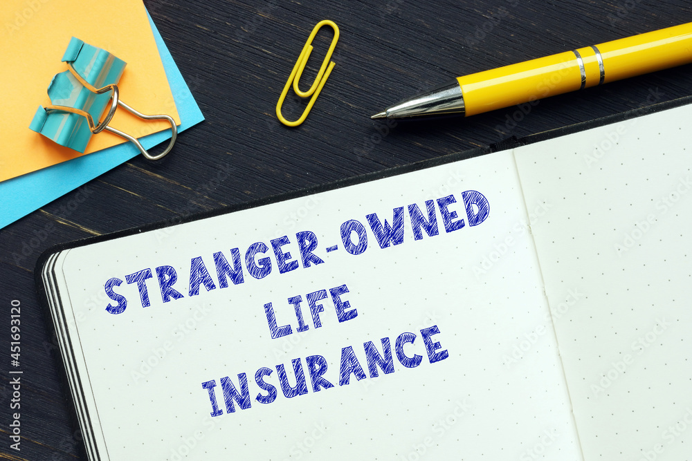 STRANGER-OWNED LIFE INSURANCE sign on the bank form STRANGER-OWNED LIFE INSURANCE sign on the bank form