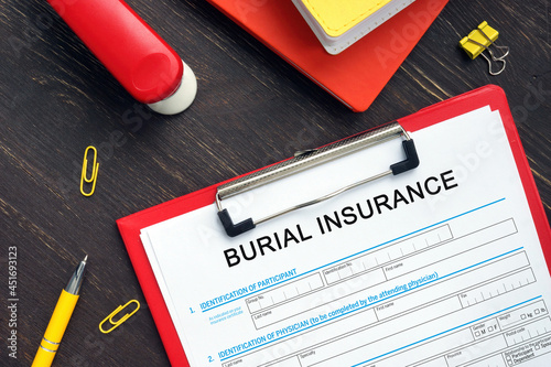Фотография BURIAL INSURANCE Application Form sign on the financial document