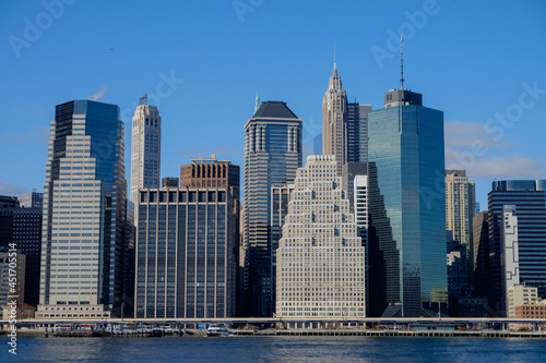 Wall Street and the lower Manhattan New York Financial District in late afternoon light