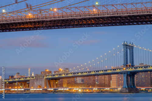 The Brooklyn Bridge and the Manhattan bridge spanning the East River from Brooklyn into Lower Manhattan and the financial district of New York City © Jorge Moro