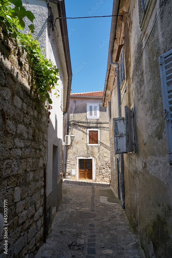 deserted alley in the historical old town of Krk on the island of Krk in Croatia