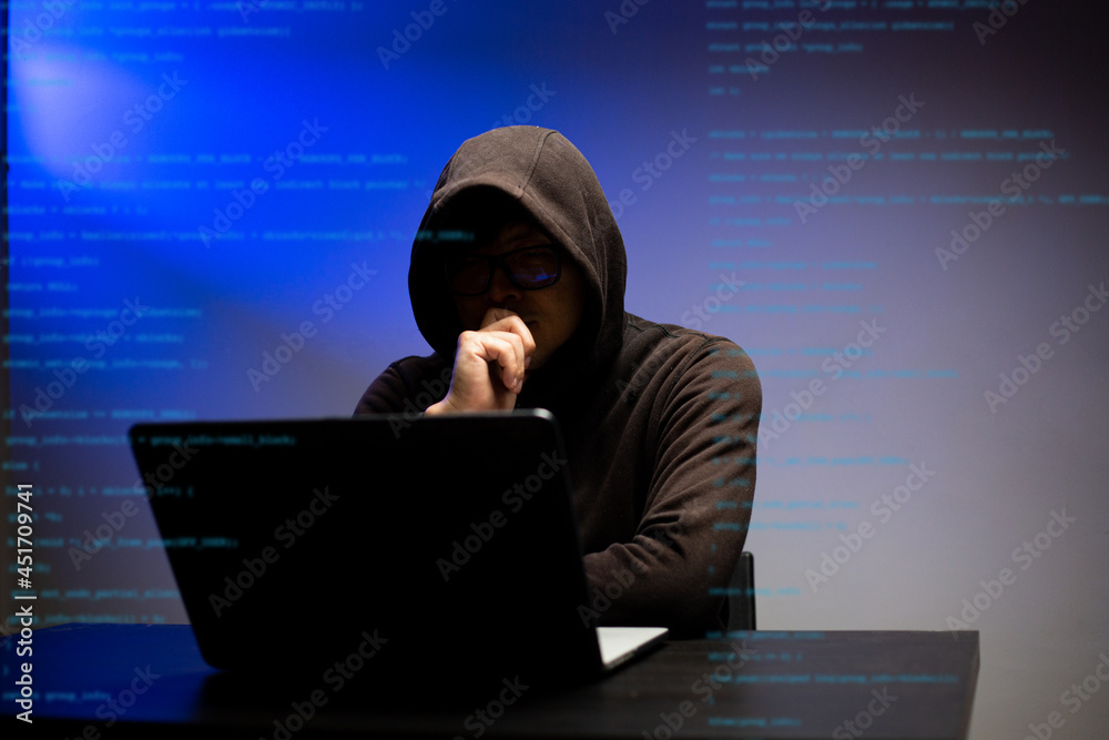 Hacker hooded dangerous hacking information government data servers