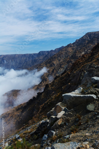 Mountain ridge in the clouds photo