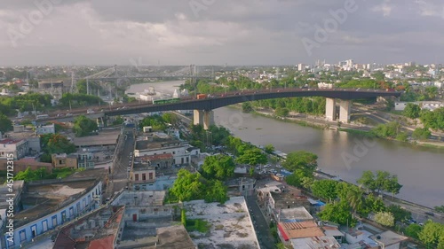 Aerial panoramic view of Ciudad Colonial the historic central neighborhood of Santo Domingo, with highway bridge traffic car in the capital of Dominican Republic  photo