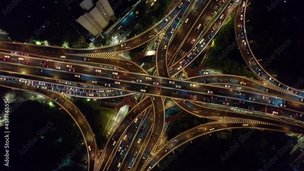 At night, cars flow on the city overpass At night, cars flow on the city overpass