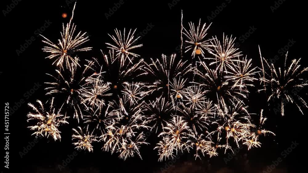 4K.  seamless loop of real colorful fireworks festival in the sky display at night during national holiday, new year party or celebration event.