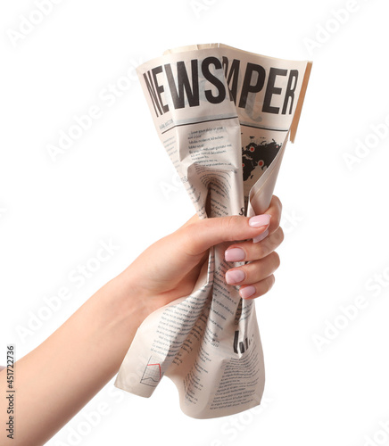 Female hand and crumpled ne...