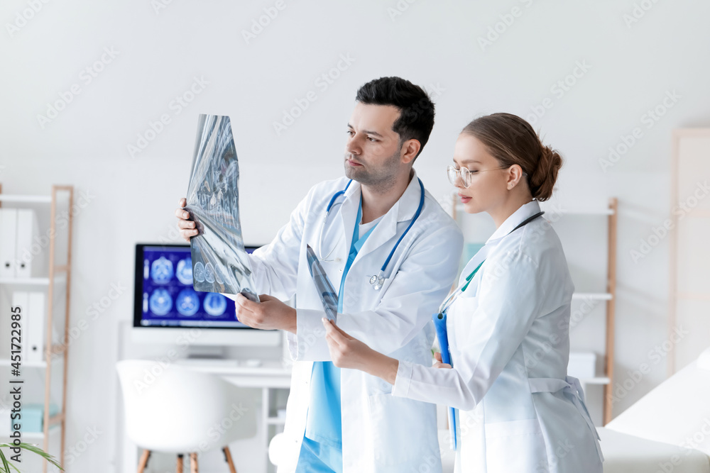 Fototapeta premium Doctors with x-ray scans in clinic