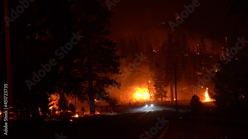 People Evacuate from fast moving wildfire photo