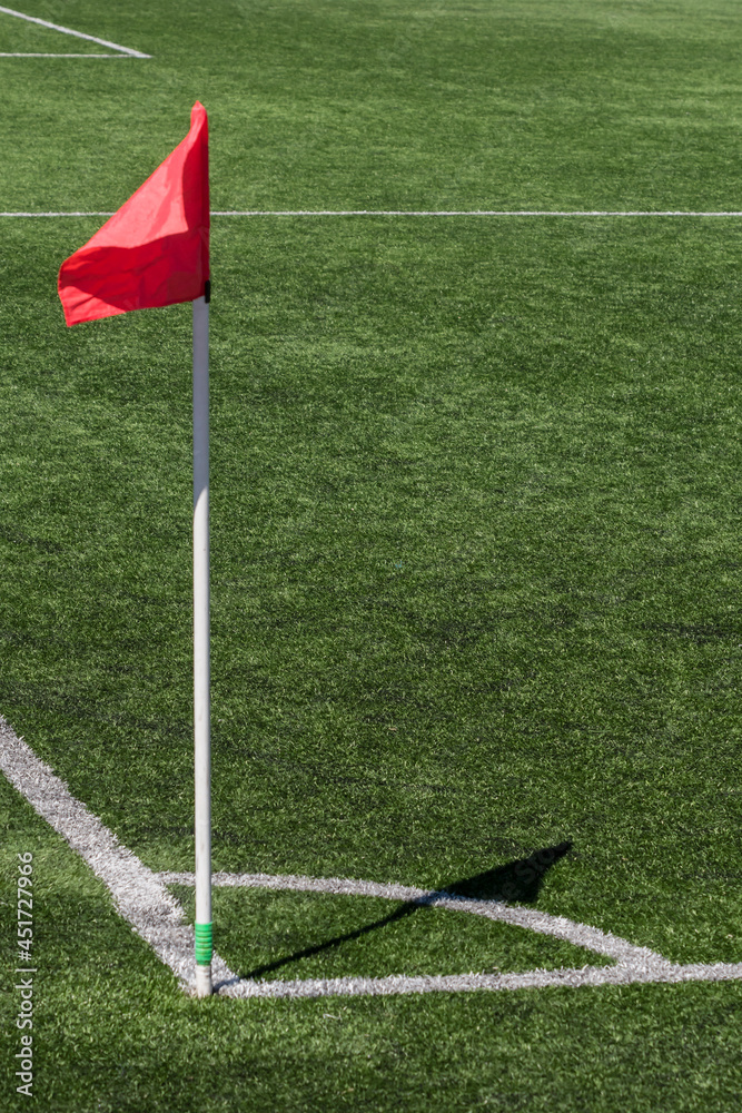 Fototapeta premium Flag on the corner of the football field.
