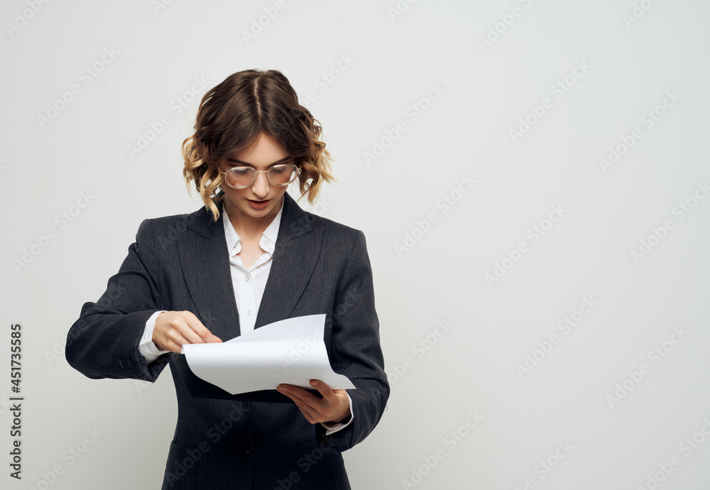 woman in business suit documents in hand Job Professional woman in business suit documents in hand Job Professional