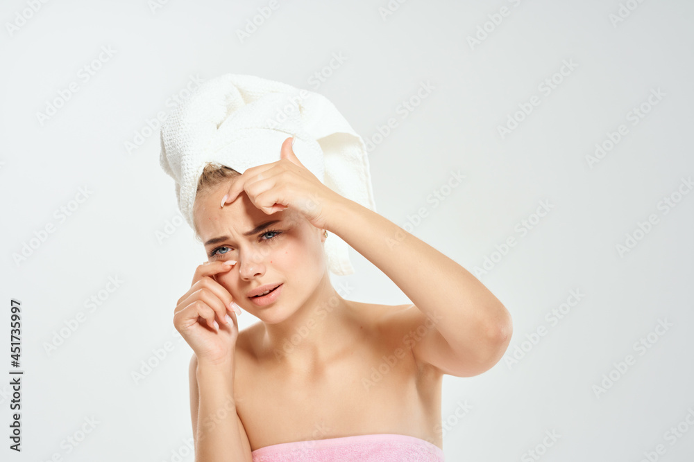woman with towel on head acne dermatology dissatisfaction skin problems woman with towel on head acne dermatology dissatisfaction skin problems