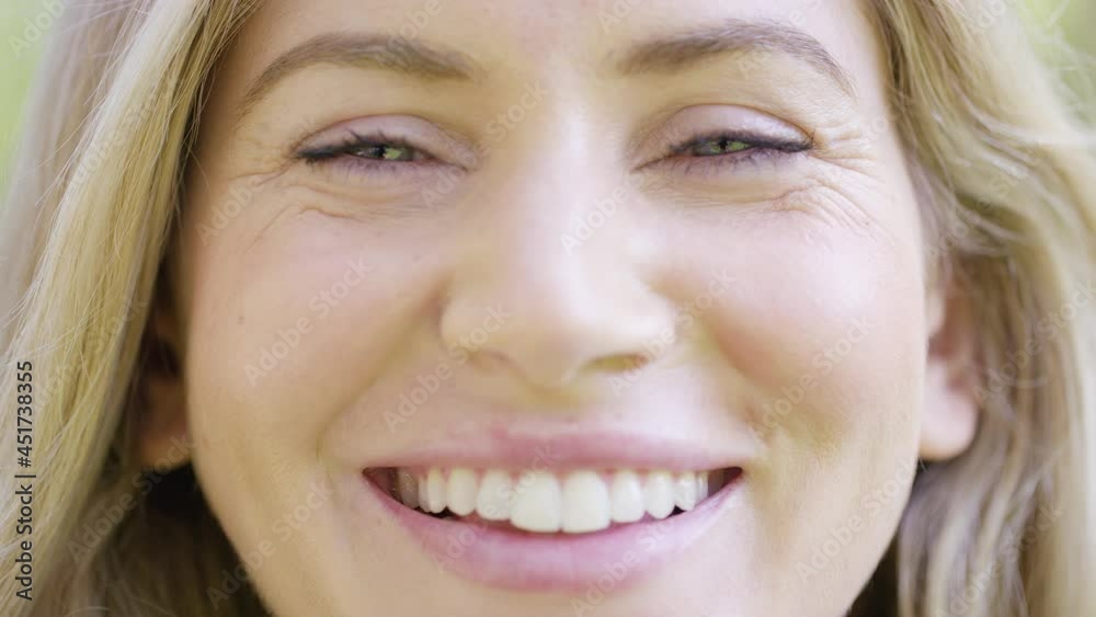 Close up portrait shot of young white female talking directly to camera Close up portrait shot of young white female talking directly to camera