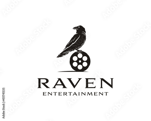 Black raven bird with Film Equipments. Good logo design for Movie Maker or Movie Studio