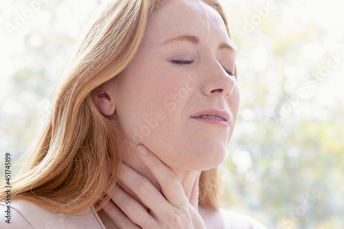 Woman with sore throat