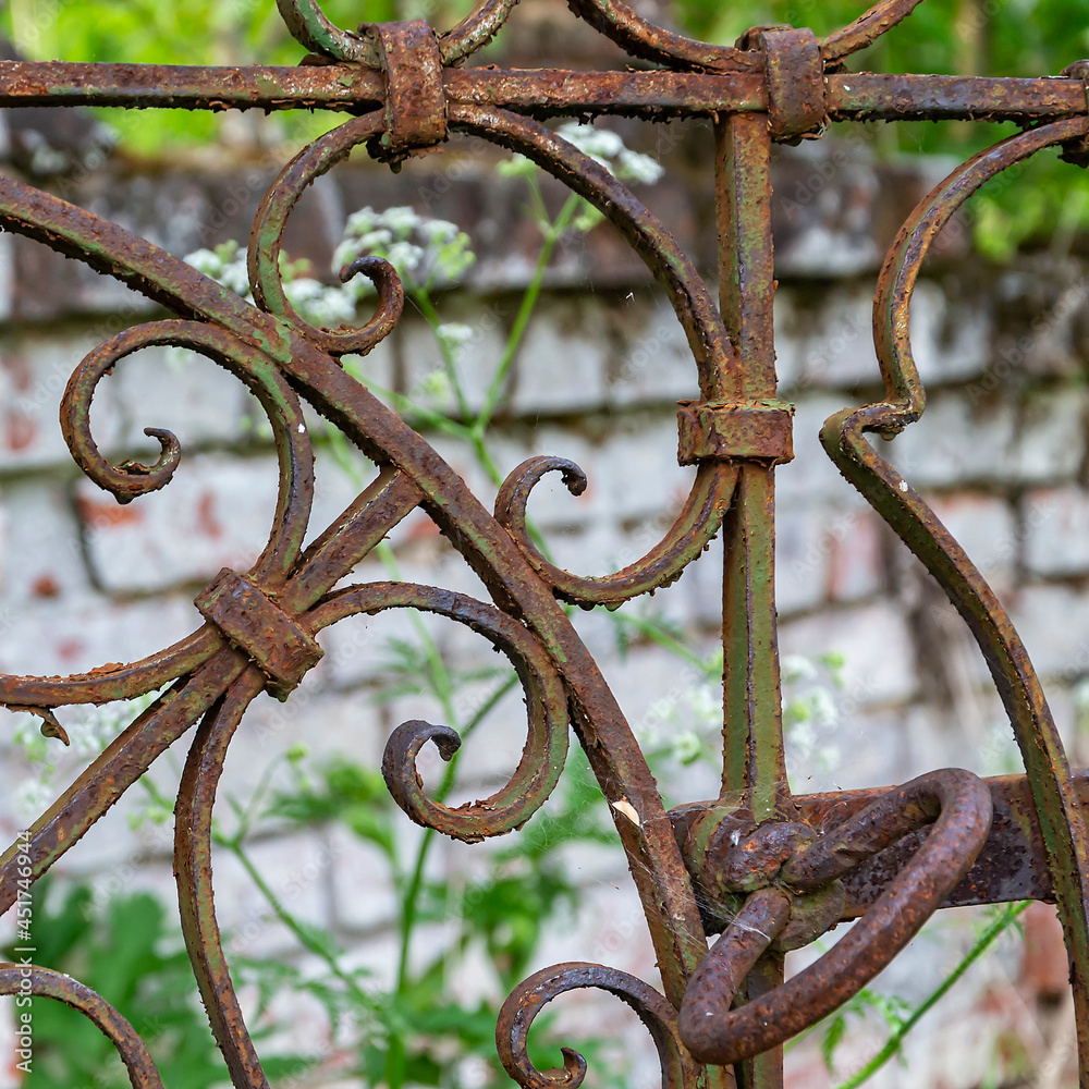 antique, rusty, shaped metal grating antique, rusty, shaped metal grating