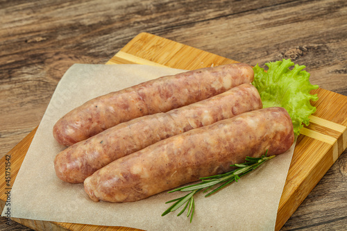 Raw pork meat sausages for grill