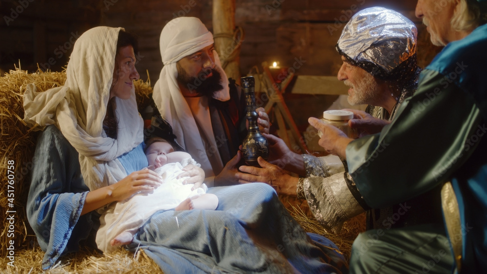 Magi giving presents to baby Jesus