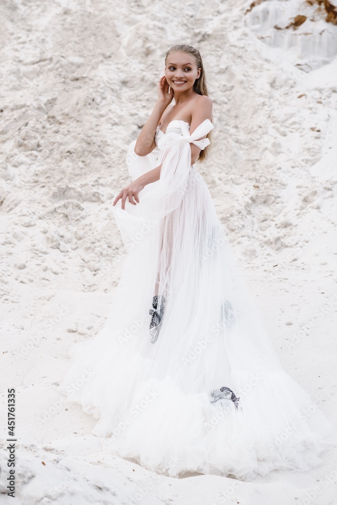 Beautiful wedding bride day outdoors at ocean beach. Happy marriage couple o Beautiful wedding bride day outdoors at ocean beach. Happy marriage couple o