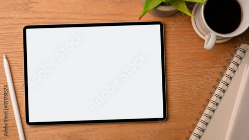 Bilde på lerret wood background, digital tablet screen mockup, stylus pen, notepads, black coffe