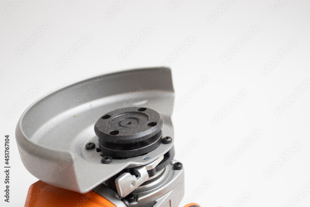 New angle grinder for cutting on white background. New angle grinder for cutting on white background.