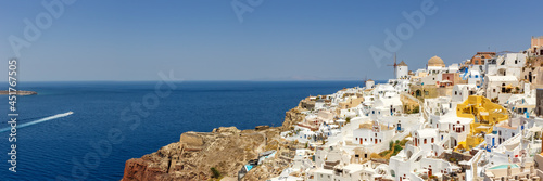 Santorini island holidays in Greece travel traveling Oia town Mediterranean Sea with windmills Santorin panorama