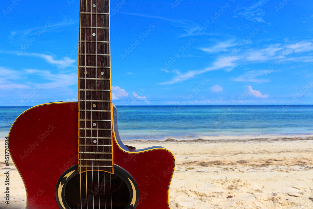 Fototapeta acoustic guitar on the beach