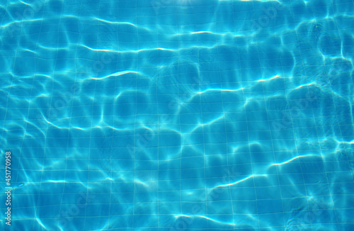 Swimming pool water surface in the sunlight