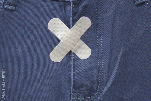 Men's pants taped over the groin area as a symbol of virginity and sexual abstinence. photo