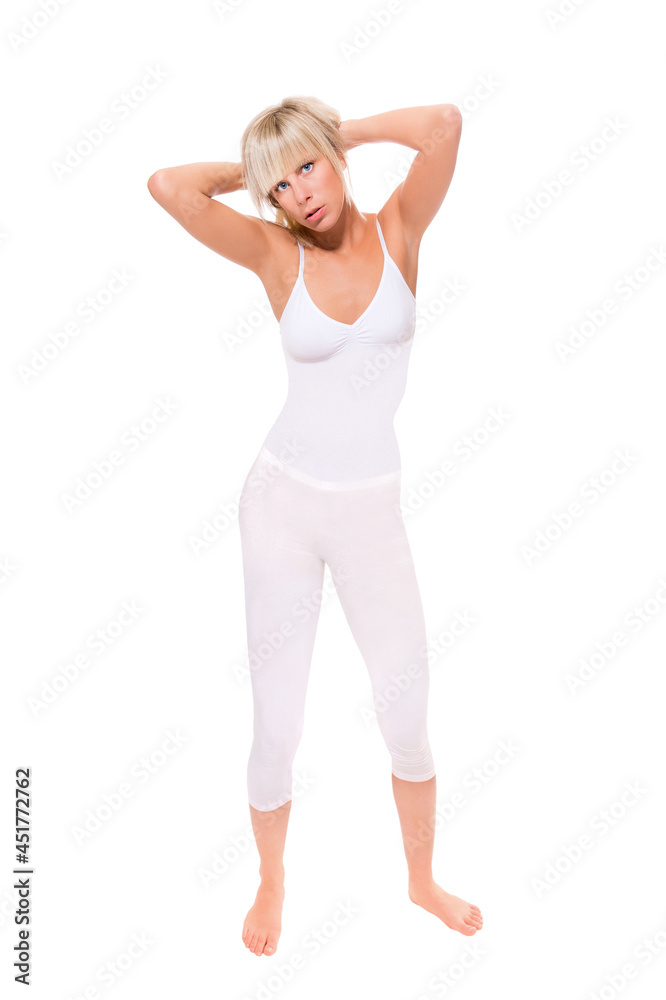 Full length portrait of a beautiful blonde woman wearing white sportswear, studio photo isolated in front of white background Full length portrait of a beautiful blonde woman wearing white sportswear, studio photo isolated in front of white background