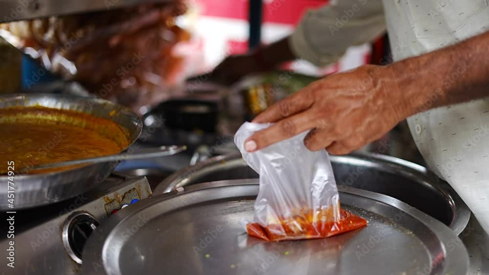 indian street food making preparing proses. Ragda Patis for take away