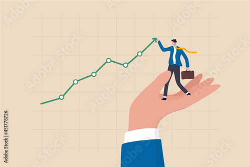 Drive sale increasing profit, business growth planning, support or help to increase income or profit, wealth management or investment concept, businessman standing on helping hand pull up rising graph