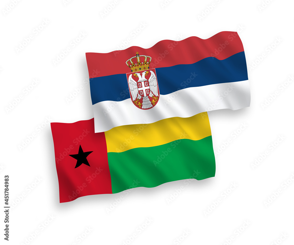 National vector fabric wave flags of Republic of Guinea Bissau and Serbia isolated on white background. 1 to 2 proportion. National vector fabric wave flags of Republic of Guinea Bissau and Serbia isolated on white background. 1 to 2 proportion.
