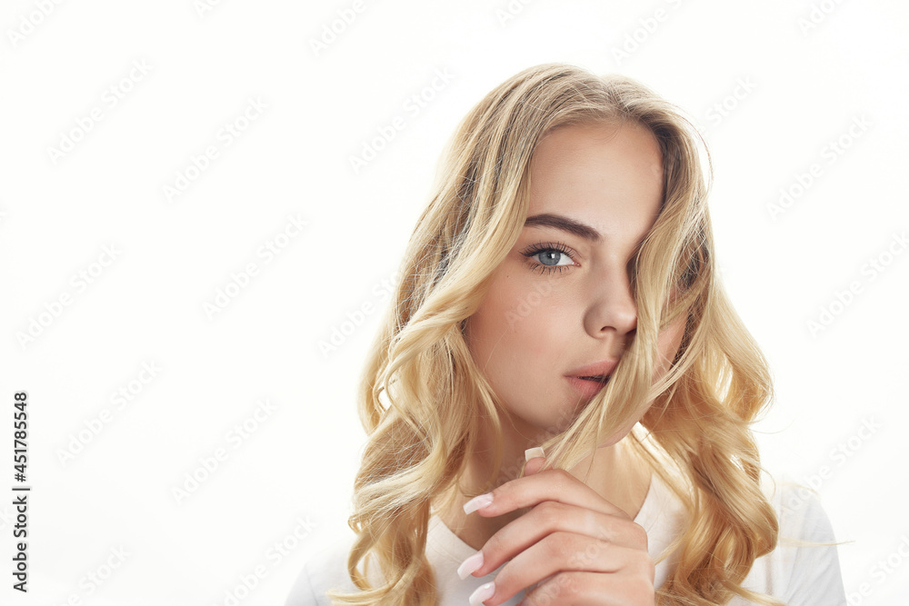 pretty blonde holding hair cosmetics face close-up pretty blonde holding hair cosmetics face close-up