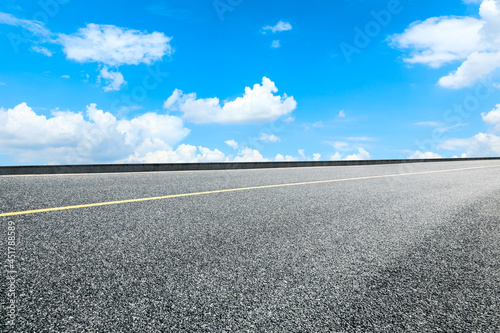 Empty and clean asphalt road and sky landscape in summer, Asia © zhao dongfang