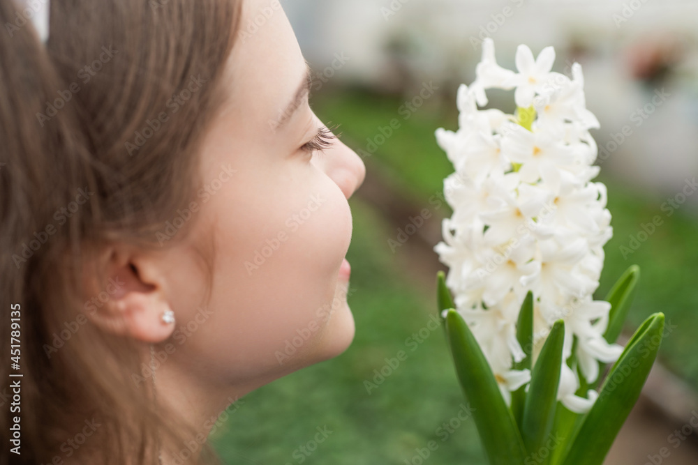 smell of nature. flower care. horticulture. gardening activity for kid. happy teen girl florist