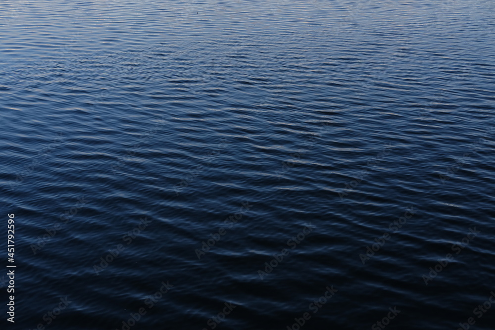 A close-up on the water of the harbour of Saint-Nazaire. August 2021, France. A close-up on the water of the harbour of Saint-Nazaire. August 2021, France.