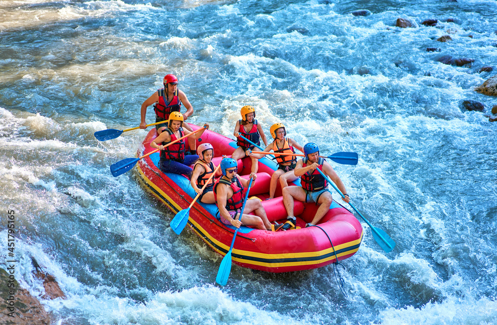 rafting on a large boat on a mountain river - obrazy, fototapety, plakaty 