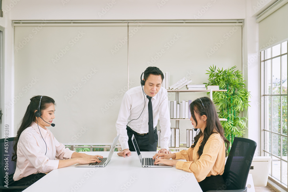 Fototapeta premium Office of call center agents for support customer case in helpdesk service solution