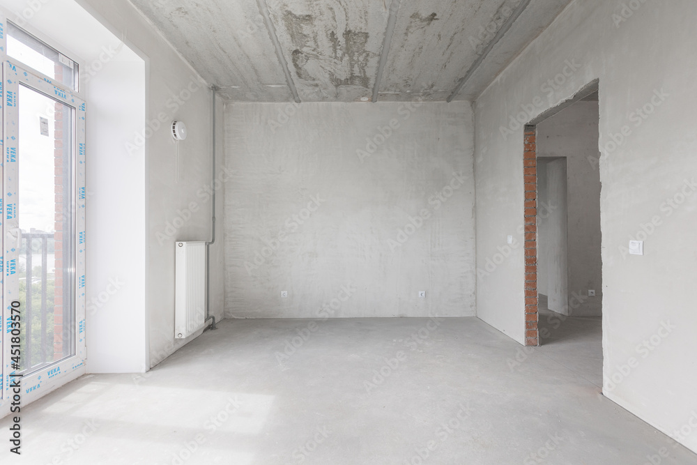 Obraz premium interior of the apartment without decoration in gray colors