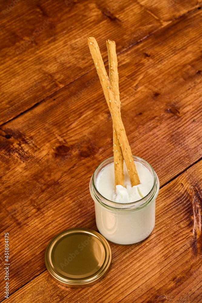 various dairy products in glass jars, organic products. various dairy products in glass jars, organic products.