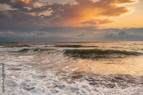 Charming sunset on the black sea beach in Georgia.