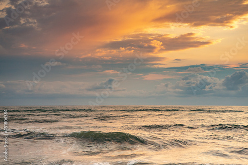 Fototapeta Naklejka Na Ścianę i Meble -  Charming sunset on the black sea beach in Georgia.
