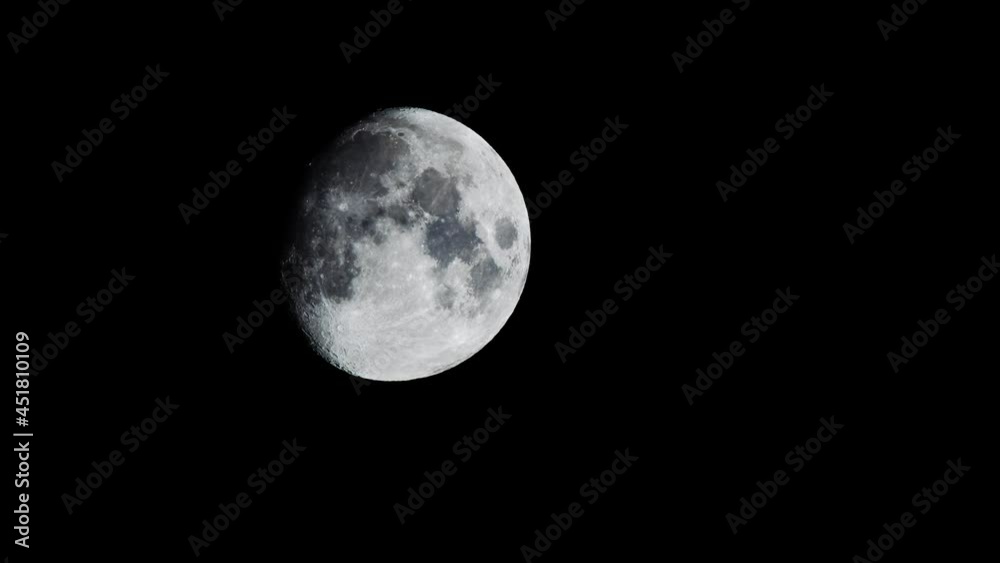 Realistic animation of the moon in a dark night sky behind the stylish striped orange and black Halloween curtain. Live footage plus 3D animation rendered in UHD. Realistic animation of the moon in a dark night sky behind the stylish striped orange and black Halloween curtain. Live footage plus 3D animation rendered in UHD.