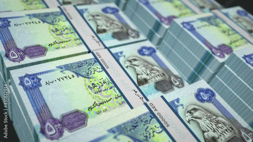 Arab Emirates Dirhams money pack loop 3d animation. Loopable seamless concept of finance, cash, economy, business and bank. Camera moving over the 500 AED Dubai banknote bundle stacks.