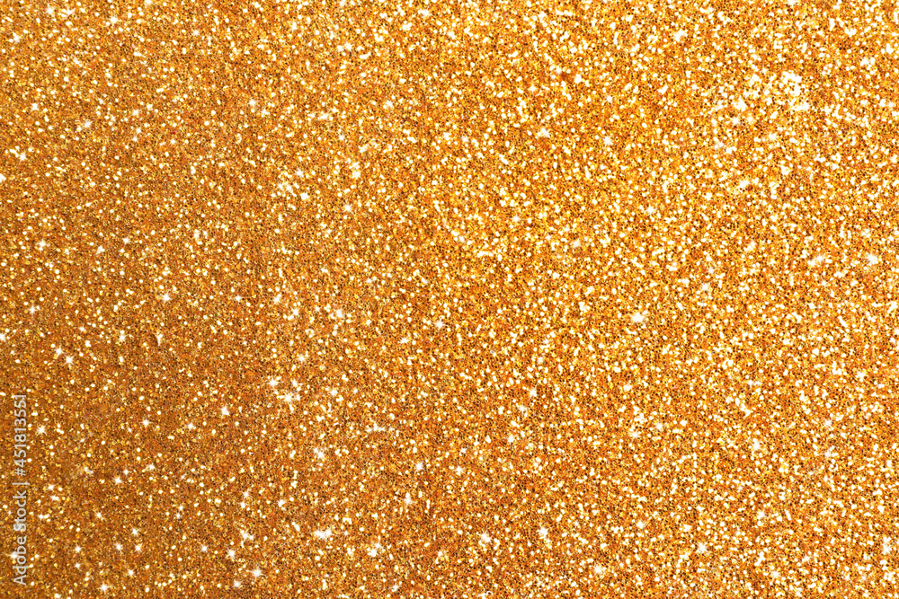 Beautiful shiny golden glitter as background, closeup Beautiful shiny golden glitter as background, closeup