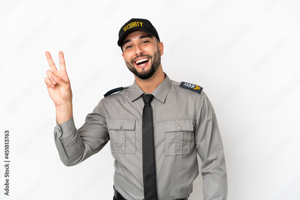 Young arab man isolated on white background smiling and showing victory sign Young arab man isolated on white background smiling and showing victory sign